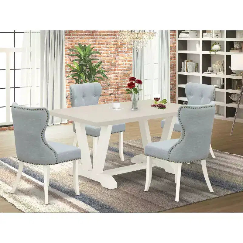 Table de salle à manger HomeStock 5 pièces rectangulaire au fini chêne naturel avec plateau moucheté et 4 chaises Parson bleu bébé.
