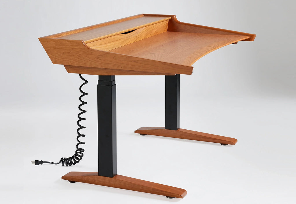 Lift Desk - La conception a été inspirée par le besoin d'un bureau ergonomique, flexible et très fonctionnel répondant aux exigences actuelles.