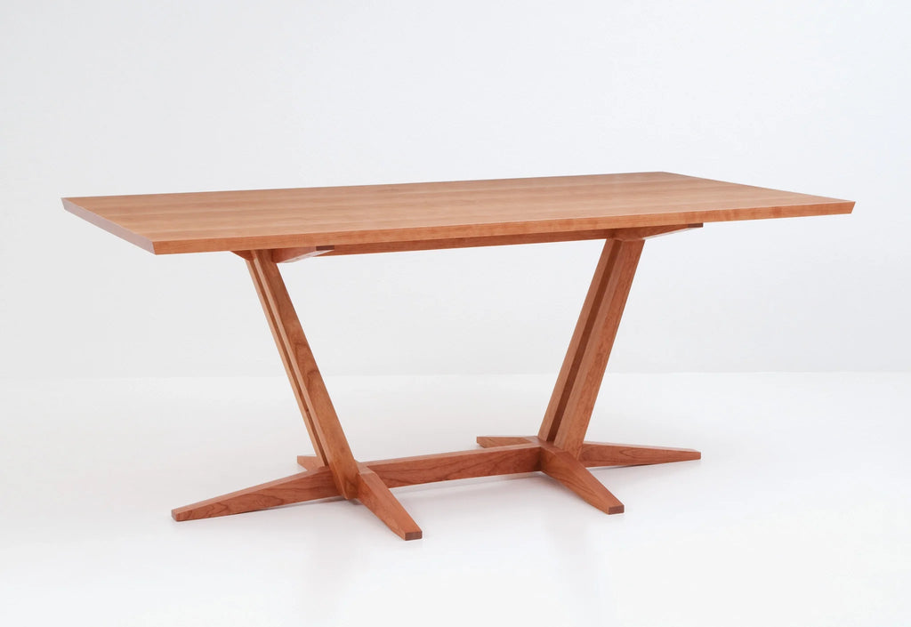 Table tréteaux - Jouant avec les contraires comme l'ombre et la lumière, l'espace et la substance, elle rassemble tout en une seule entité.